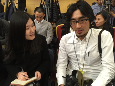 2015级国新班史越采访《朝日新闻》摄影记者
